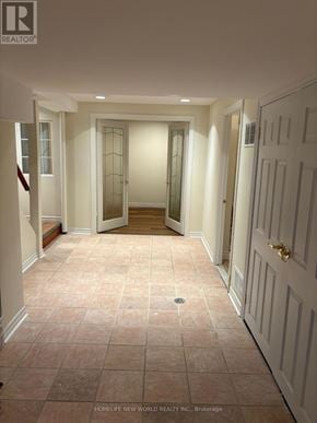 Markham (Berczy) apartment for rent - A hallway with tiled floors and white walls.