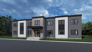 Liverpool apartment for rent - A modern two-story house with a front porch.
