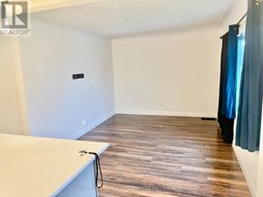 Hamilton (Hill Park) apartment for rent - A room with wooden flooring and a white countertop.