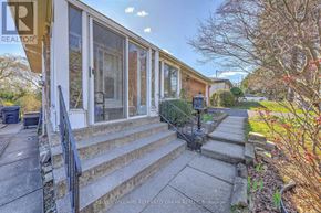 Toronto (St. Andrew-Windfields) apartment for rent - A house with a white door and windows is for sale.
