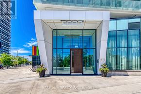 Mississauga (City Centre) condo for rent - The entrance to a building with the number 3333 on it.