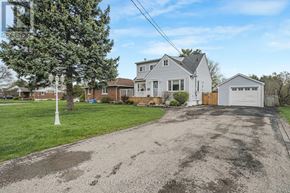 Niagara Falls (Church's Lane) apartment for rent - A house with a driveway in front of it.