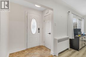 Niagara Falls (Church's Lane) apartment for rent - A white door with a window above it.