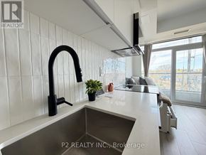 Toronto (Centennial Scarborough) condo for rent - A modern kitchen with a large sink and a black faucet.