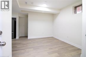 Kitchener apartment for rent - A room with a door and a window.