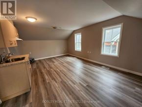 Markham (Wismer) apartment for rent - A room with wooden flooring and a window.