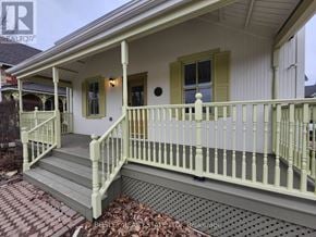 Markham (Wismer) apartment for rent - A house with a porch and a covered patio.