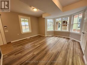 Markham (Wismer) apartment for rent - A room with wooden flooring and a large window.