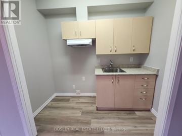 Markham (Wismer) apartment for rent - A kitchen area with wooden floors and a sink.