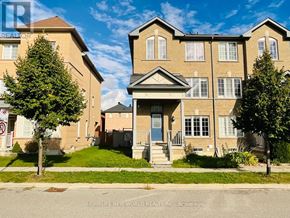 Markham (Cornell) apartment for rent - A large brick apartment building with a blue door and a sign that says "No Parking".