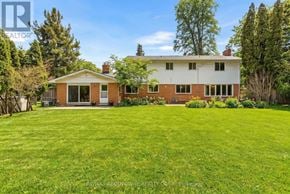 Oakville (Sw Southwest) apartment for rent - A house with a lawn in front of it.