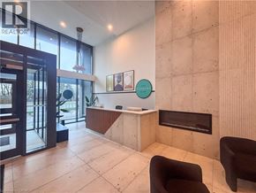 Kitchener condo for rent - A reception area with a desk and chairs.