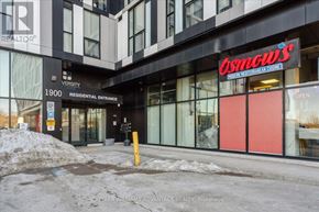 Oshawa (Samac) condo for rent - A building with a sign that says "Osmgws" on it.