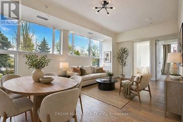 Toronto (Birchcliffe-Cliffside) townhouse for rent - A well-lit, spacious living room with a dining table and chairs.