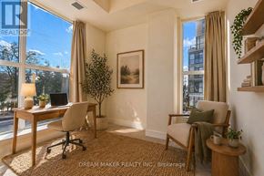 Toronto (Birchcliffe-Cliffside) townhouse for rent - A well-lit room with a desk, chair, and a potted plant.