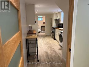 Toronto (Woburn) apartment for rent - A kitchen with a washing machine in it.