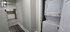 St. Thomas apartment for rent - A white washing machine is in a small laundry room.