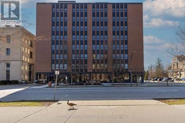 London East (East F) condo for rent - A building with a sign that says REALTOR in the upper left corner.