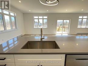 Mcnab/Braeside multi-family for rent - A kitchen with a sink and a window.