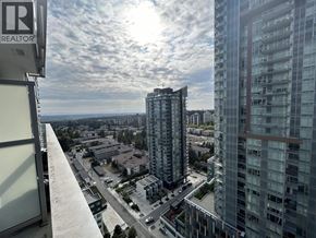 Burnaby apartment for rent - A view from a high-rise building looking down at a cityscape.