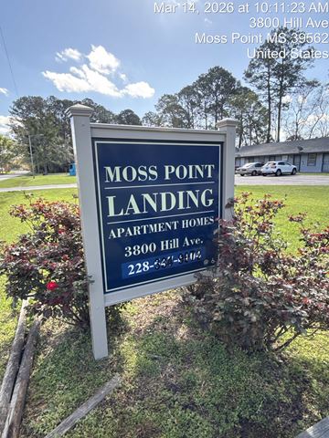 Moss Point apartment for rent - A blue and white sign for Moss Point Landing Apartment Homes.