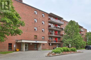 Oshawa (Lakeview) condo for rent - A red brick building with the number 600 on the front.