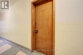 Burlington (Brant) multi-family for rent - A wooden door with the number 304 on it.