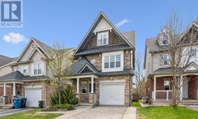 Guelph (Kortright West) apartment for rent - A row of houses with a clear blue sky above them.