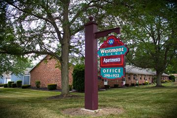 Springfield apartment for rent - A sign for Westmont Apartments stands in front of a building.