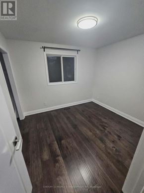Toronto (Glenfield-Jane Heights) apartment for rent - A room with a window and wooden flooring.
