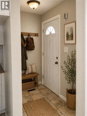 Hamilton apartment for rent - A hallway with a white door, a bench, and a plant.
