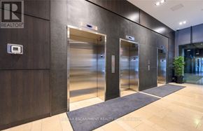 Burlington (Uptown) condo for rent - A brokerage office entrance with a sign that says RE/MAX Escarpment Realty Brokerage.