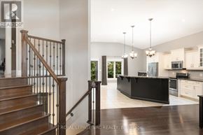 St. Catharines (Lakeshore) apartment for rent - A modern kitchen with a black countertop and stainless steel appliances.