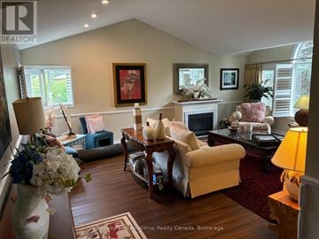 Collingwood apartment for rent - A well decorated living room with a fireplace and a painting on the wall.