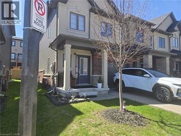 Cambridge townhouse for rent - A house with a sign that says no fire hydrant.