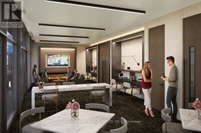 Hamilton (Kirkendall) condo for rent - A modern dining room with a TV screen and people conversing.