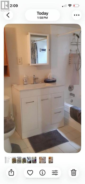 Toronto (East End-Danforth) apartment for rent - A bathroom with a white sink and a mirror above it.