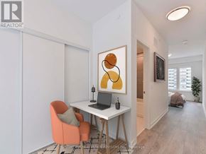 Toronto (L'amoreaux) townhouse for rent - A room with a desk, chair, and painting.