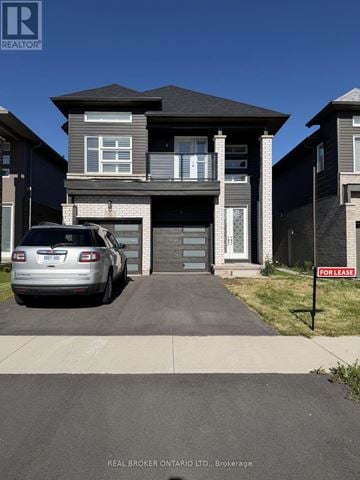 Welland (Lincoln/Crowland) apartment for rent - A house with a car parked in front and a "For Lease" sign on the lawn.