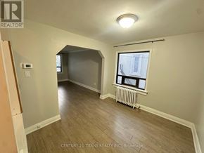Toronto (Birchcliffe-Cliffside) apartment for rent - A room with a window and a radiator on the floor.