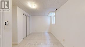 Markham (Middlefield) apartment for rent - A white room with a door and a window.
