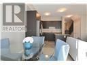 Hamilton (Carpenter) townhouse for rent - A realtor logo is on a glass table.