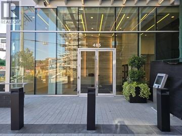 Vancouver apartment for rent - The image shows the entrance to a building with a glass door and a number 485 on it.