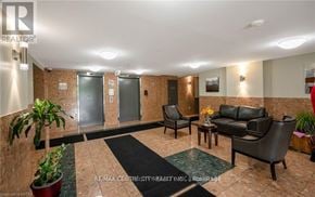 London North (North I) condo for rent - A living room with a couch, chairs, and a coffee table.