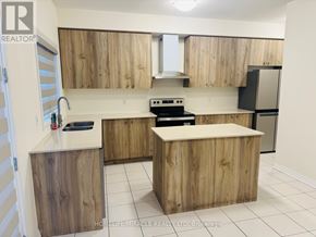 Wellington North (Arthur) apartment for rent - A kitchen with wooden cabinets and a white countertop.