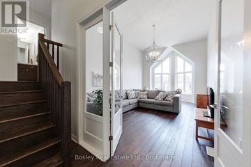 Blue Mountains townhouse for rent - A living room with a couch and a television set.