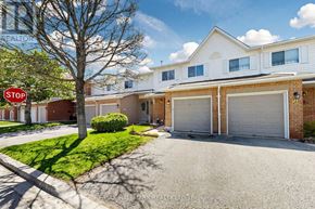Newmarket (Summerhill Estates) townhouse for rent - A stop sign is in front of a house.