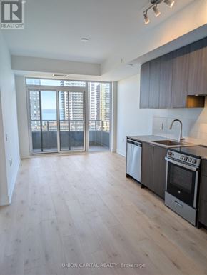 Burlington (Brant) condo for rent - A kitchen with a stove top oven and a sink.