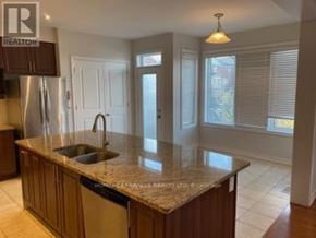 Brampton (Credit Valley) apartment for rent - A kitchen with a granite countertop and a sink.
