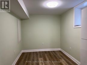 Thorold (Rolling Meadows) apartment for rent - A room with wooden flooring and white walls.